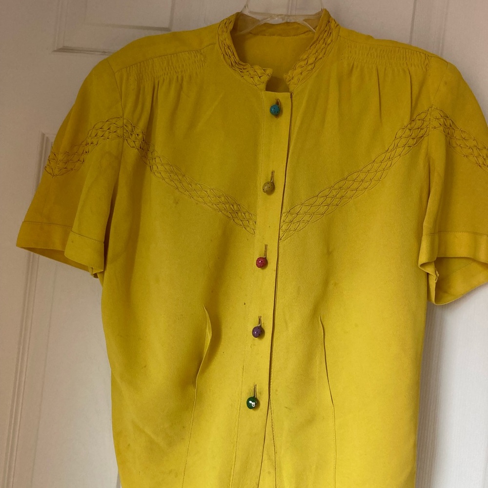 Vintage top; exquisite intricate stitchwork; hand-painted buttons.